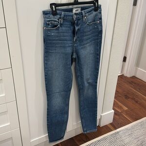 This ultra skinny jean hits just above the ankle bone With a high rise